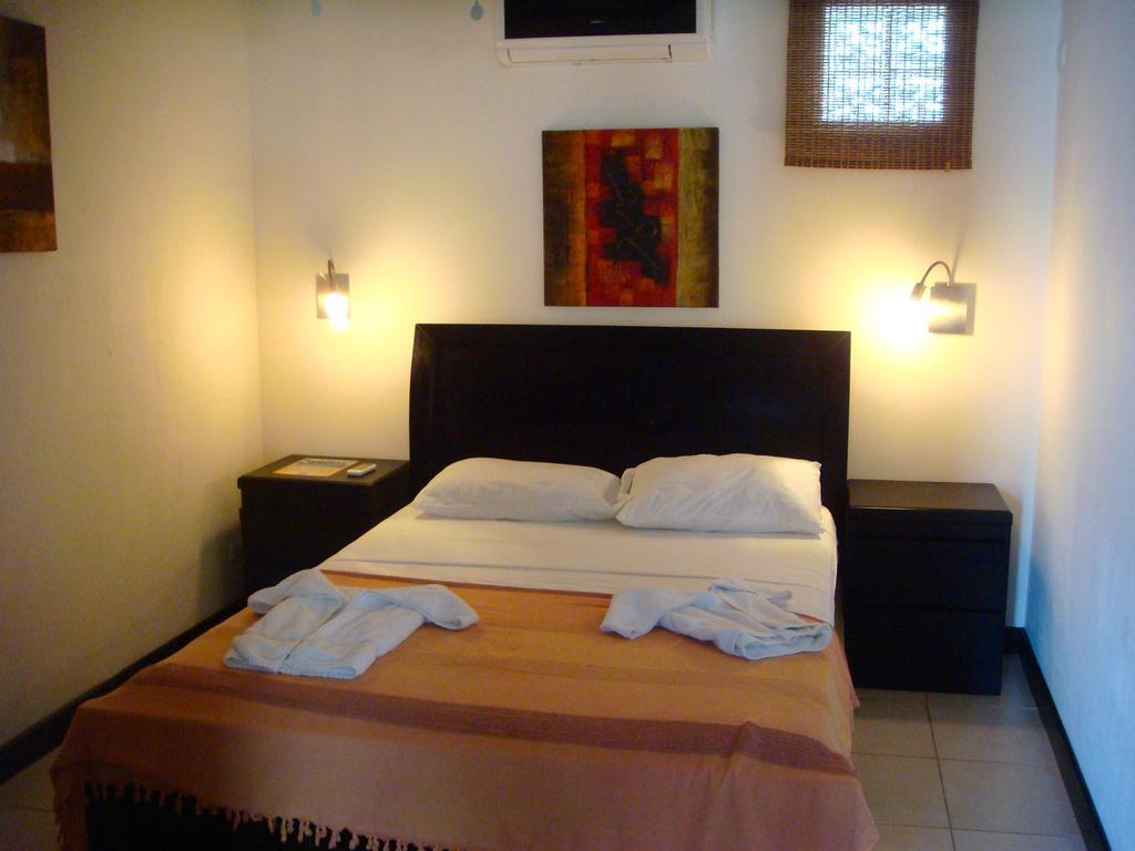 Tuanis Aparthotel Jacó Стая снимка