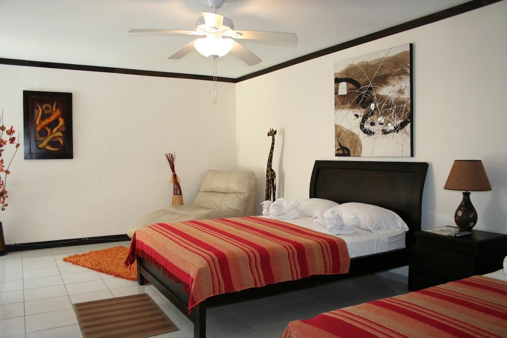 Tuanis Aparthotel Jacó Стая снимка