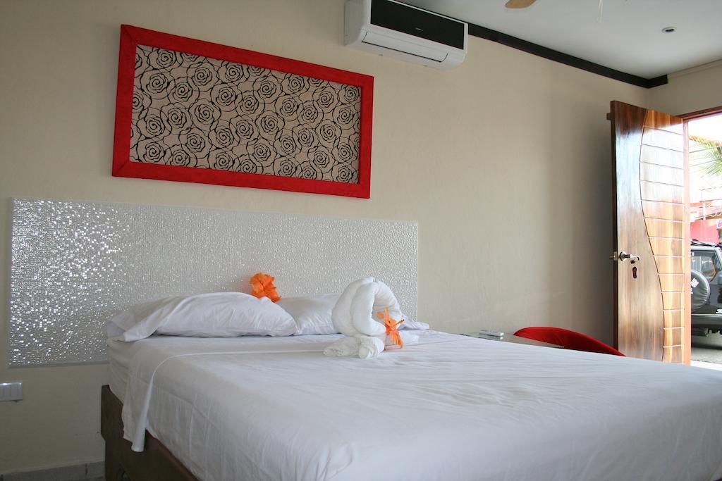 Tuanis Aparthotel Jacó Стая снимка